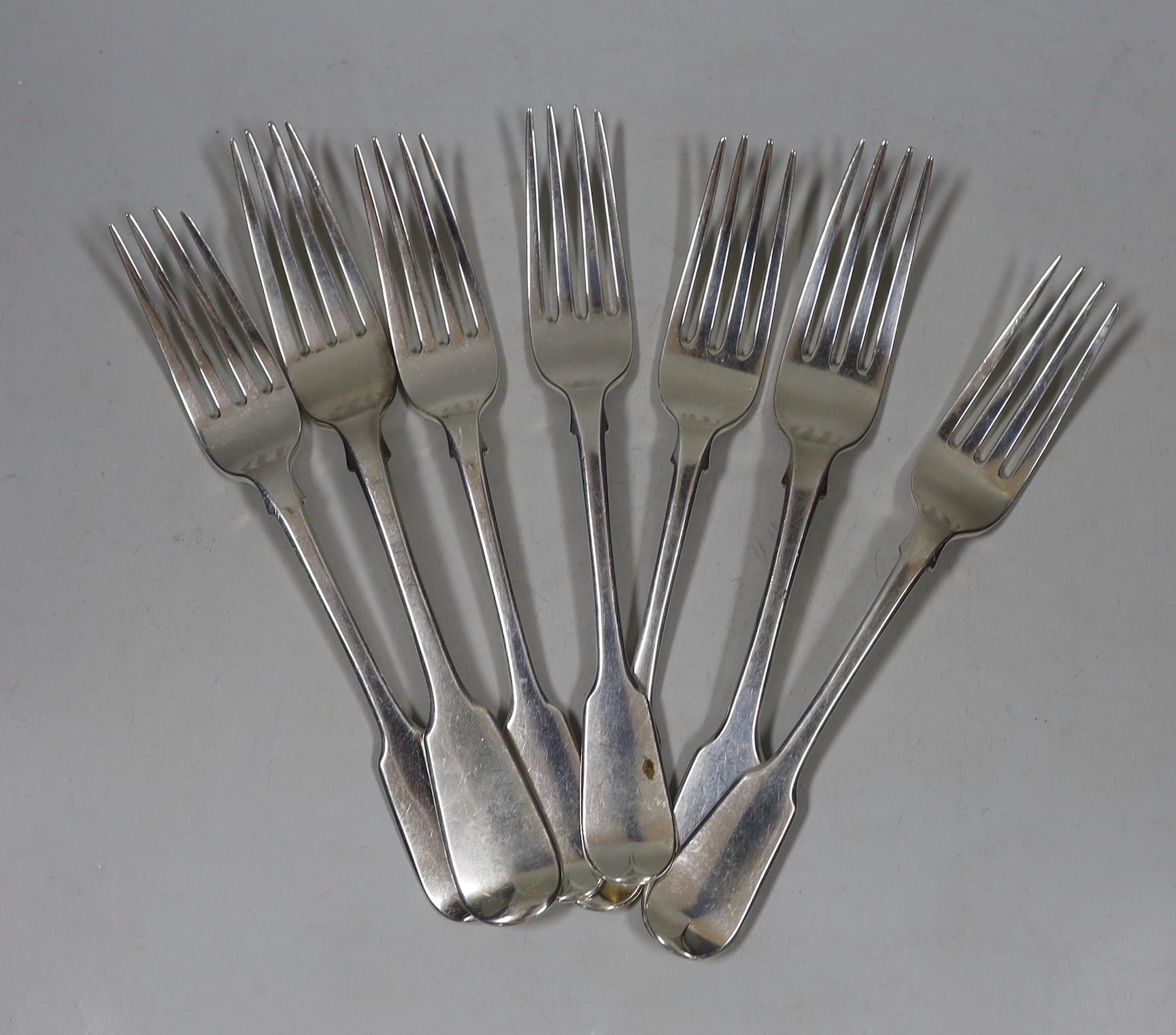 A harlequin set of seven George IV/William IV silver fiddle pattern table forks, including five by James Beebem London, 1836, 14.2oz.